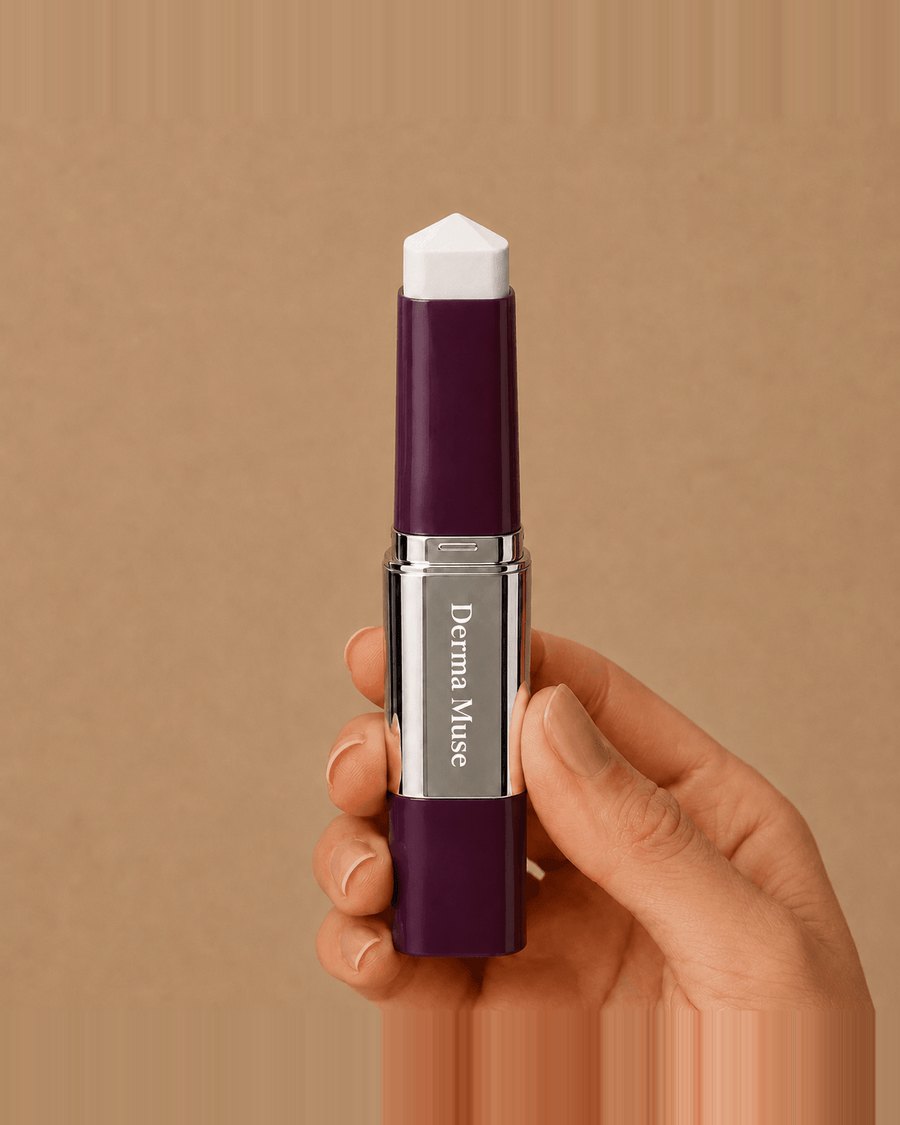 Twisting open the Derma Muse stick, the balm is white in the tube